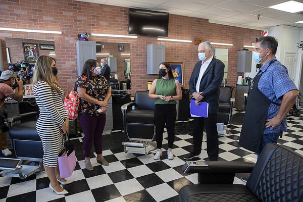 Governor visits Las Vegas barbershop to tout COVID recovery plan - Las Vegas  Sun News